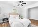 Bright bedroom with a neutral color palette, plush bedding, and a ceiling fan at 3683 Hilton Dr, Johns Island, SC 29455