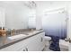 Bathroom features double vanity, modern fixtures, gray countertop and shower with curtain at 3718 Sandy Gate Ln, Mount Pleasant, SC 29466