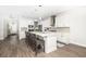 Open concept kitchen features a large island, modern lighting, and stainless appliances at 3718 Sandy Gate Ln, Mount Pleasant, SC 29466