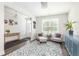 Bright living room with stylish furnishings, a decorative rug, and a view of the entryway at 3718 Sandy Gate Ln, Mount Pleasant, SC 29466