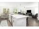 Open floor plan combining the kitchen, dining area, and living room in a bright space at 3718 Sandy Gate Ln, Mount Pleasant, SC 29466