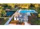 Aerial view of community amenities including a pool, pool house, tennis courts, and playground at 4263 Hugh Bennett Dr, Johns Island, SC 29455