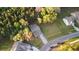 Aerial view of a single-Gathering home with a long drive in a wooded area at 4263 Hugh Bennett Dr, Johns Island, SC 29455