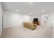 Spacious carpeted basement with neutral walls, recessed lighting, and entertainment area at 4263 Hugh Bennett Dr, Johns Island, SC 29455