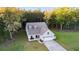 Charming single-Gathering home with a welcoming front porch, attached garage, and neatly kept lawn at 4263 Hugh Bennett Dr, Johns Island, SC 29455
