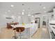 Open floorplan features a large kitchen island, stainless appliances and a connected dining area at 4263 Hugh Bennett Dr, Johns Island, SC 29455