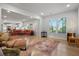 Open-concept living room seamlessly connected to a kitchen and sitting area, creating an inviting space at 4263 Hugh Bennett Dr, Johns Island, SC 29455