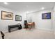 Home office with a desk, shelving, and a view to the window at 4263 Hugh Bennett Dr, Johns Island, SC 29455