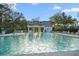 Resort-style pool with a splash fountain and covered seating area perfect for relaxing at 4263 Hugh Bennett Dr, Johns Island, SC 29455