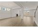 Spacious living room with fireplace, complemented by wood floors and ample natural light at 503 Fiskdale Cir, Summerville, SC 29486