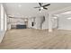 Expansive living space connecting to a modern kitchen, staircase, and other living areas at 503 Fiskdale Cir, Summerville, SC 29486