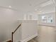 This well-lit living room features hardwood floors, neutral paint, and large windows at 503 Fiskdale Cir, Summerville, SC 29486
