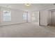 Large bedroom with carpet, two windows, and an ensuite bathroom at 503 Fiskdale Cir, Summerville, SC 29486