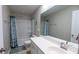 Bathroom featuring tub with shower, gray walls, nautical theme and white vanity at 5138 Preserve Blvd, Ladson, SC 29456