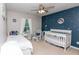 Calming bedroom with a celestial theme, including a crib and twin bed, perfect for a shared space at 5138 Preserve Blvd, Ladson, SC 29456