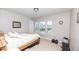 Bedroom features bright natural light, carpeted floors, ceiling fan, and space for relaxation and fitness at 5138 Preserve Blvd, Ladson, SC 29456