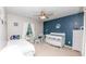 Calming bedroom with a celestial theme, including a crib and twin bed, perfect for a shared space at 5138 Preserve Blvd, Ladson, SC 29456