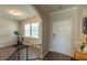 A view from the entryway into an exercise room, with hardwood floors, and natural light at 5138 Preserve Blvd, Ladson, SC 29456