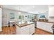 Modern kitchen with island and stainless steel appliances and breakfast nook at 5138 Preserve Blvd, Ladson, SC 29456