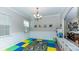A play room featuring colorful flooring, natural light, and decorative art at 5138 Preserve Blvd, Ladson, SC 29456
