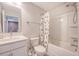 Bright bathroom features a shower-tub combo with modern fixtures and a stylish vanity at 518 Green Fern Dr, Summerville, SC 29483