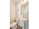 Clean, compact powder room with pedestal sink and modern fixtures at 518 Green Fern Dr, Summerville, SC 29483
