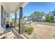 Cozy front porch featuring dark columns, landscaping, and a seating area enhancing the welcoming atmosphere at 518 Green Fern Dr, Summerville, SC 29483