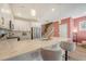 Bright kitchen with marble countertops, stainless steel appliances, and a breakfast bar at 518 Green Fern Dr, Summerville, SC 29483