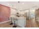 Stylish kitchen with white cabinetry, stainless appliances, and a breakfast bar perfect for casual dining at 518 Green Fern Dr, Summerville, SC 29483