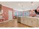 Open kitchen features a large island, stainless steel appliances, and seamless flow into the living space at 518 Green Fern Dr, Summerville, SC 29483