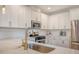 Gourmet kitchen featuring stainless steel appliances, marble countertops and ample storage space at 518 Green Fern Dr, Summerville, SC 29483