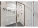 Glass shower with gray honeycomb floor tiles and white subway wall tiles at 518 Green Fern Dr, Summerville, SC 29483