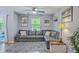 Comfortable living room with a sectional sofa, natural light, and stylish decor, creating an inviting atmosphere at 531 Truman Dr, Goose Creek, SC 29445