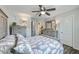 Spacious bedroom with ceiling fan, ensuite bath, and ample storage space at 531 Truman Dr, Goose Creek, SC 29445