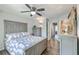 Relaxing main bedroom with ceiling fan, ensuite bath, and hallway access at 531 Truman Dr, Goose Creek, SC 29445