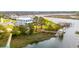 Expansive home overlooking waterfront, featuring private dock and serene coastal charm at 545 Towles Crossing Dr # 29455, Johns Island, SC 29455