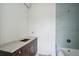 Bathroom featuring a vanity with a stone countertop and blue tiled shower at 545 Towles Crossing Dr # 29455, Johns Island, SC 29455