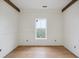 Bedroom features wood flooring, wainscotting, and exposed beams at 545 Towles Crossing Dr # 29455, Johns Island, SC 29455