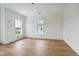Inviting bedroom with hardwood floors and bright windows offering beautiful views of the ocean at 545 Towles Crossing Dr # 29455, Johns Island, SC 29455