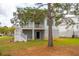 Exterior elevation of a two-story home with a large tree in the front yard at 545 Towles Crossing Dr # 29455, Johns Island, SC 29455