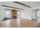 Spacious living room with hardwood floors and natural light from large windows at 545 Towles Crossing Dr # 29455, Johns Island, SC 29455