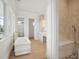 Elegant bathroom featuring a freestanding tub and marble shower at 546 Towles Crossing Dr, Johns Island, SC 29455