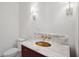 Bathroom with marble countertop, gold faucet and matching gold sink basin at 546 Towles Crossing Dr, Johns Island, SC 29455