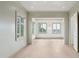 Bright bedroom with light green trim, wood floors, and lots of natural light at 546 Towles Crossing Dr, Johns Island, SC 29455