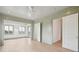 Spacious bedroom with light green trim, wood floors, and access to other rooms at 546 Towles Crossing Dr, Johns Island, SC 29455