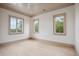 Light-filled bedroom with three windows and neutral walls and trim at 546 Towles Crossing Dr, Johns Island, SC 29455