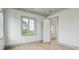 Well lit bedroom with gray trim with an open door leading to another room at 546 Towles Crossing Dr, Johns Island, SC 29455