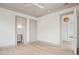Bedroom with ceiling fan, neutral walls and trim with an open door to an ensuite bathroom at 546 Towles Crossing Dr, Johns Island, SC 29455