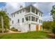Charming multi-story home with a classic colonial design and green shutters at 546 Towles Crossing Dr, Johns Island, SC 29455