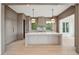 Modern kitchen with a large island, custom cabinets, and stainless steel appliances at 546 Towles Crossing Dr, Johns Island, SC 29455
